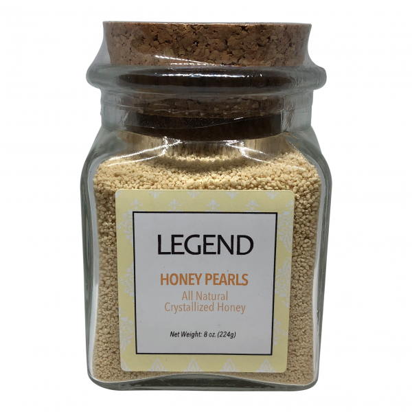 a jar of honey pearls with a All Natural crystallized Honey label on it.