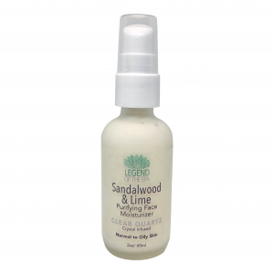 a bottle of sandalwood and lime purifying face cleanser.